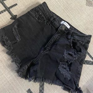Black distressed shorts